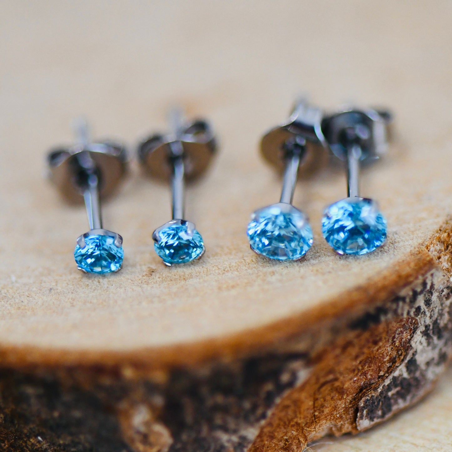 F136 Titanium Aquamarine Emerald Stud Earrings 20g Pair With Butterfly Back Blue & Green CZ Stud Earrings